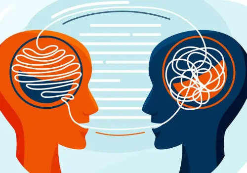 Eine Illustration zweier sich gegenüberstehender menschlicher Profile, eines orange und eines blau, mit abstrakten Linien in ihren Köpfen, die Gedanken darstellen. Gebogene Linien verbinden ihre Münder und symbolisieren Kommunikation oder den Austausch in schwierigen Gesprächen.